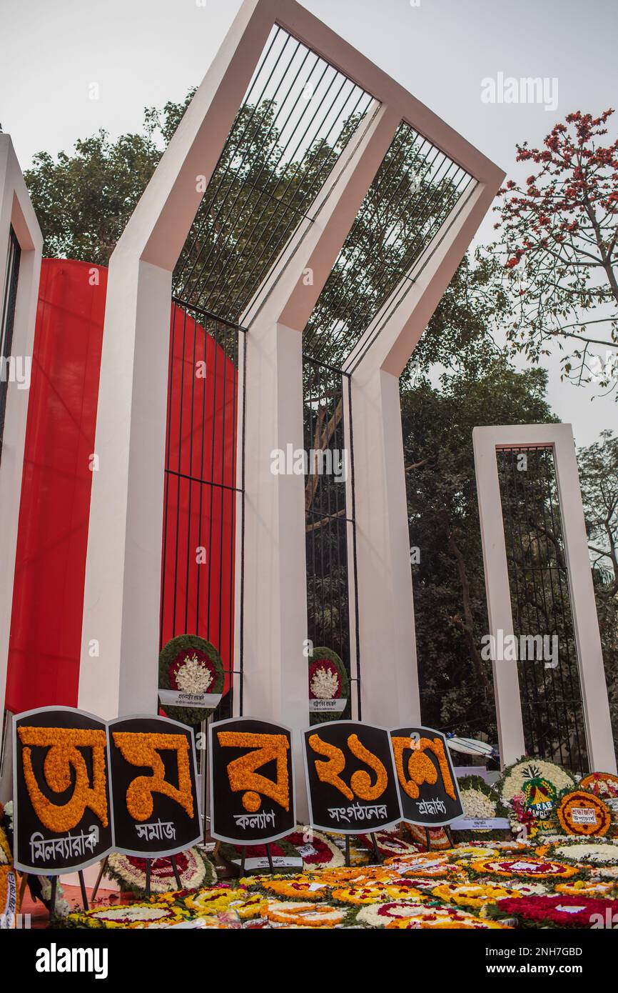 Dhaka, Bangladesh. 21st Feb, 2023. View of the martyr's monument Central Shaheed Minar decorated with flowers during the International Mother Language Day, in Dhaka. Bangladeshis pay tribute at the Martyr's Monument, or Shaheed Minar, on International Mother Language Day in Dhaka, International Mother Language Day is observed in commemoration of the movement where a number of students died in 1952, defending the recognition of Bangla as a state language of the former East Pakistan, now Bangladesh. Credit: SOPA Images Limited/Alamy Live News Stock Photo