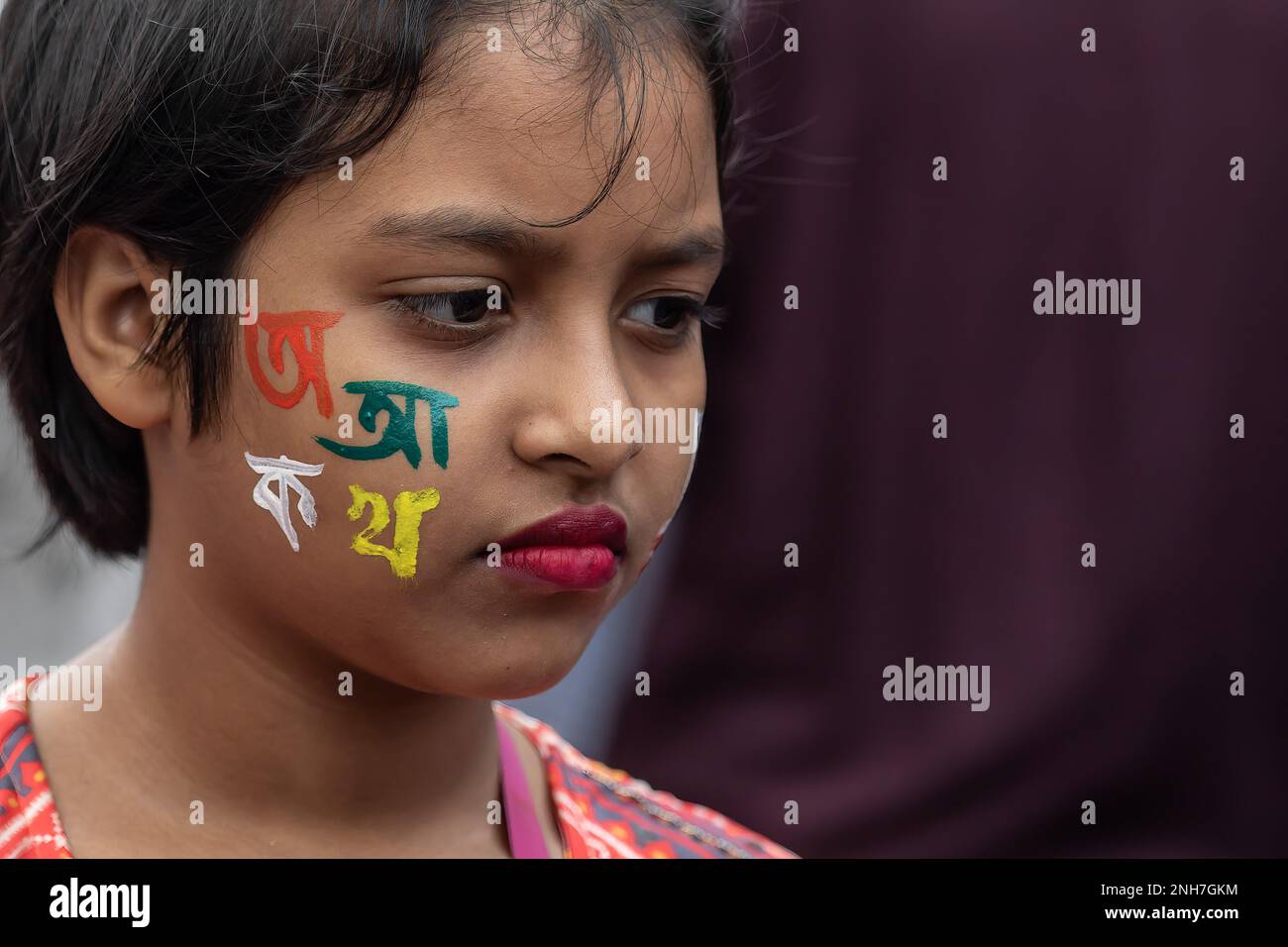 Dhaka, Bangladesh. 21st Feb, 2023. A kid seen with paint on her face at ...