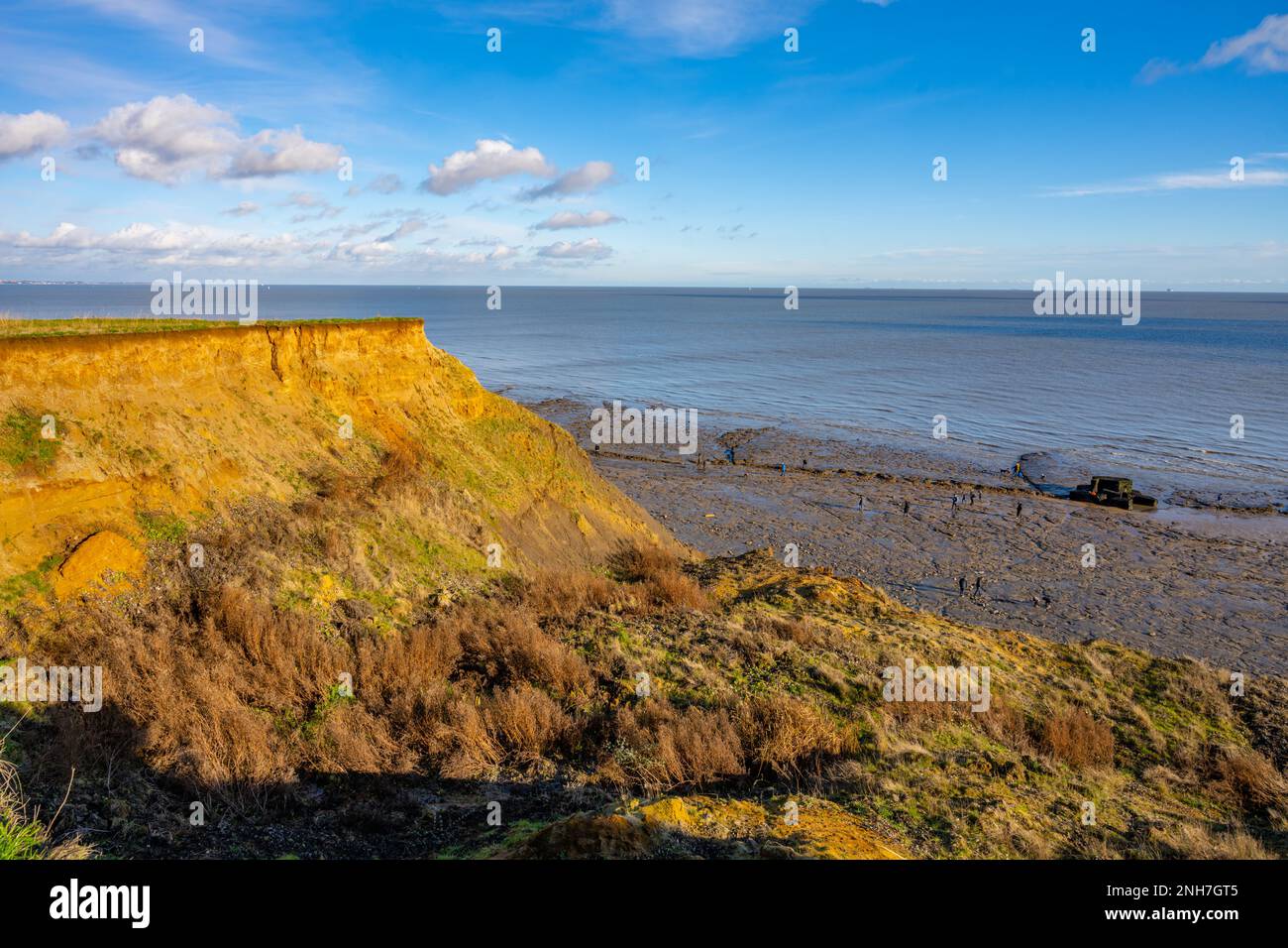 Looking out into the North Sea with the eroding cliffs of Walton on the Naze in the foreground Stock Photo