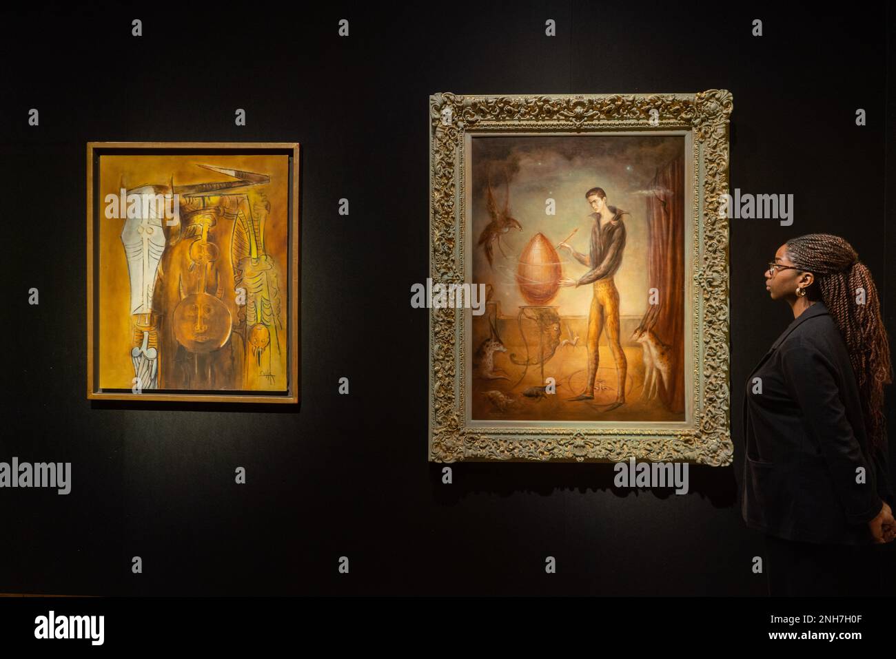 London, UK. 21 February 2023. .L-R WIFREDO LAM (1902-1982) Untitled, Estimate GBP 300,000 – GBP 500,000-  LEONORA CARRINGTON (1917-2011) Quería ser pájaro Estimate GBP 900,000 – GBP 1,400,000. Preview of Christie's The Art of the Surreal Evening Sale. The sale takes place on 28 February at Christie's London. Credit: amer ghazzal/Alamy Live News Stock Photo