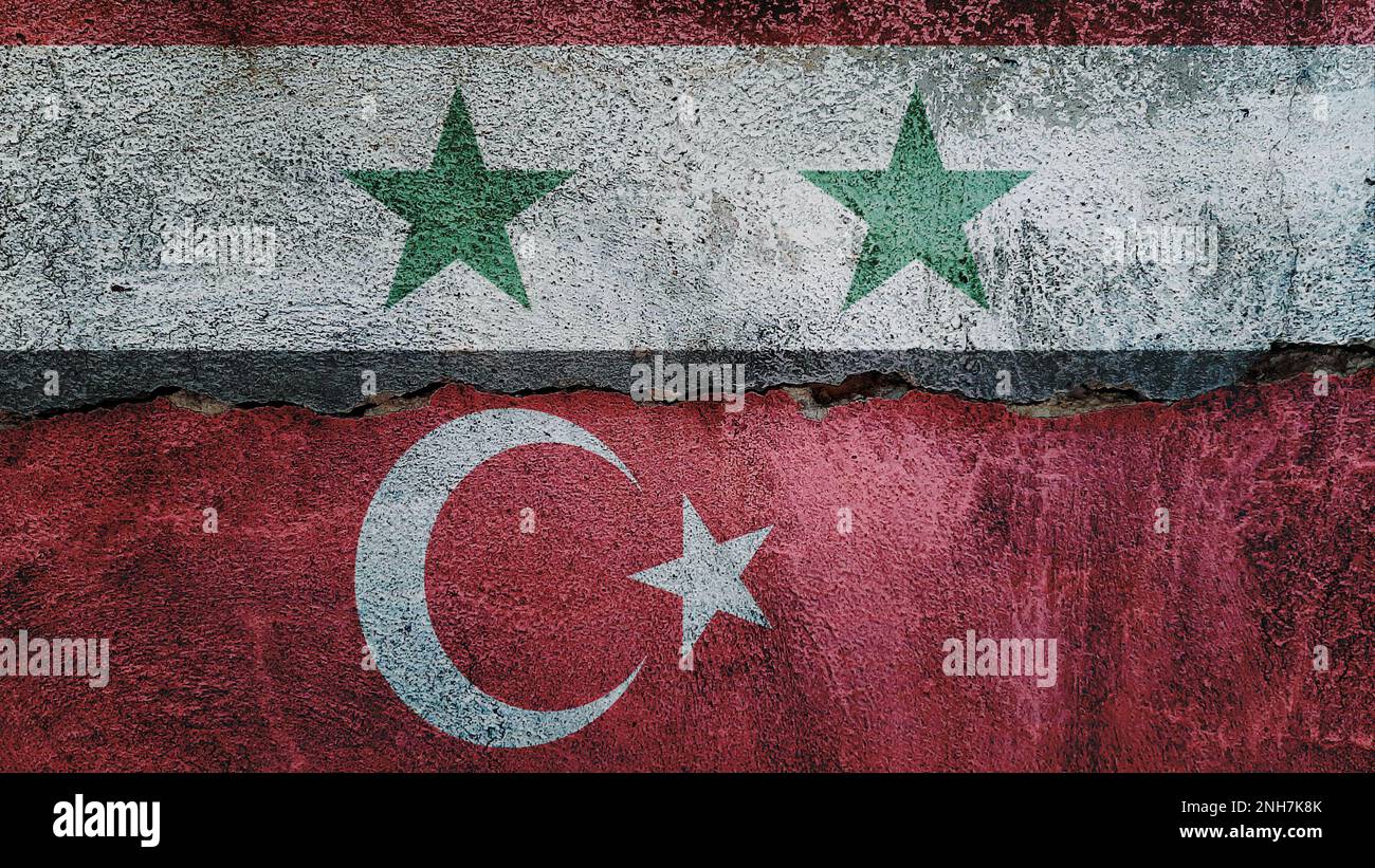 Syria and Turkey flag on cracked wall background. Economics, politics