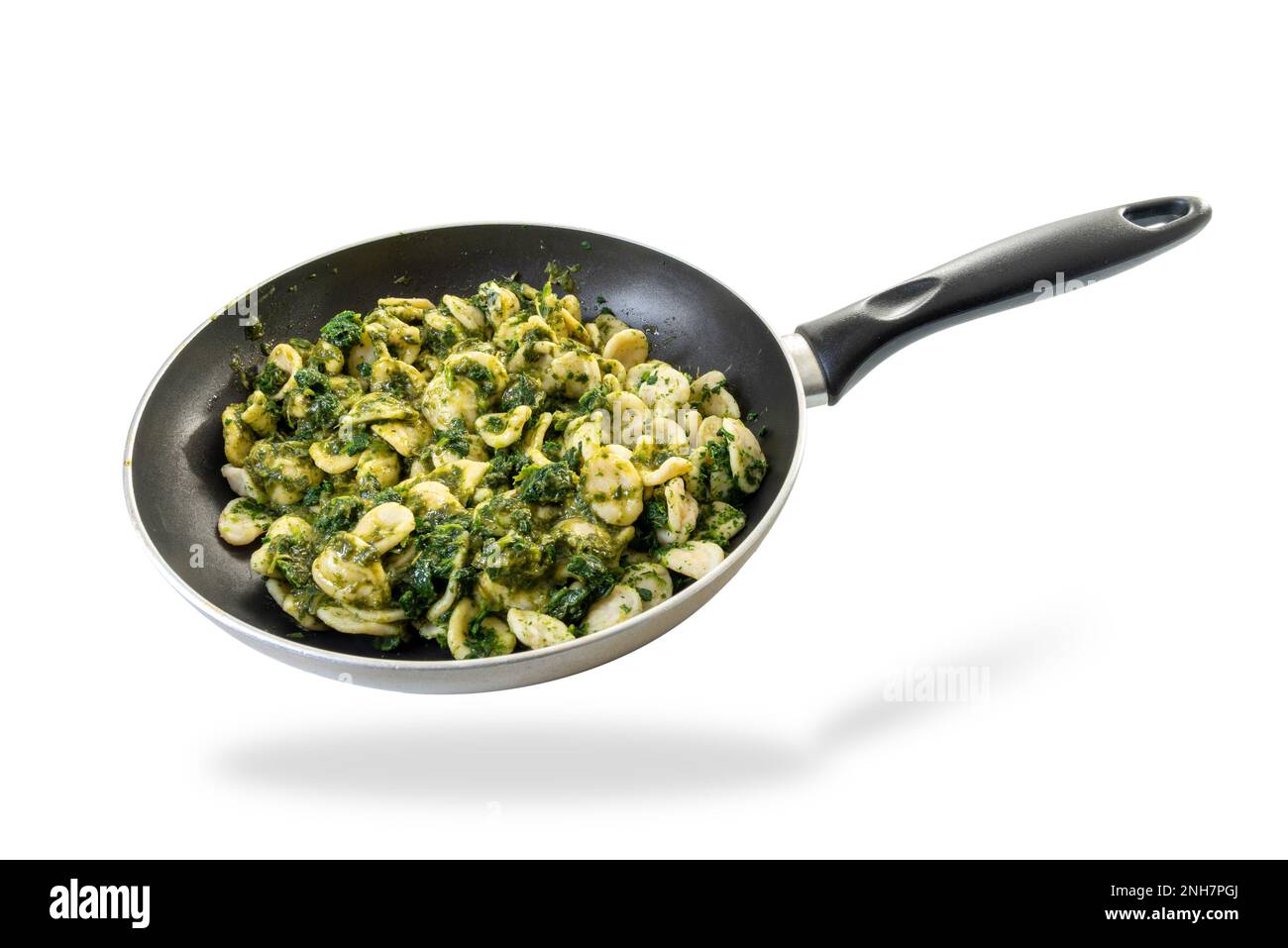 Orecchiette pasta with panfried turnip tops, typical Italian recipe