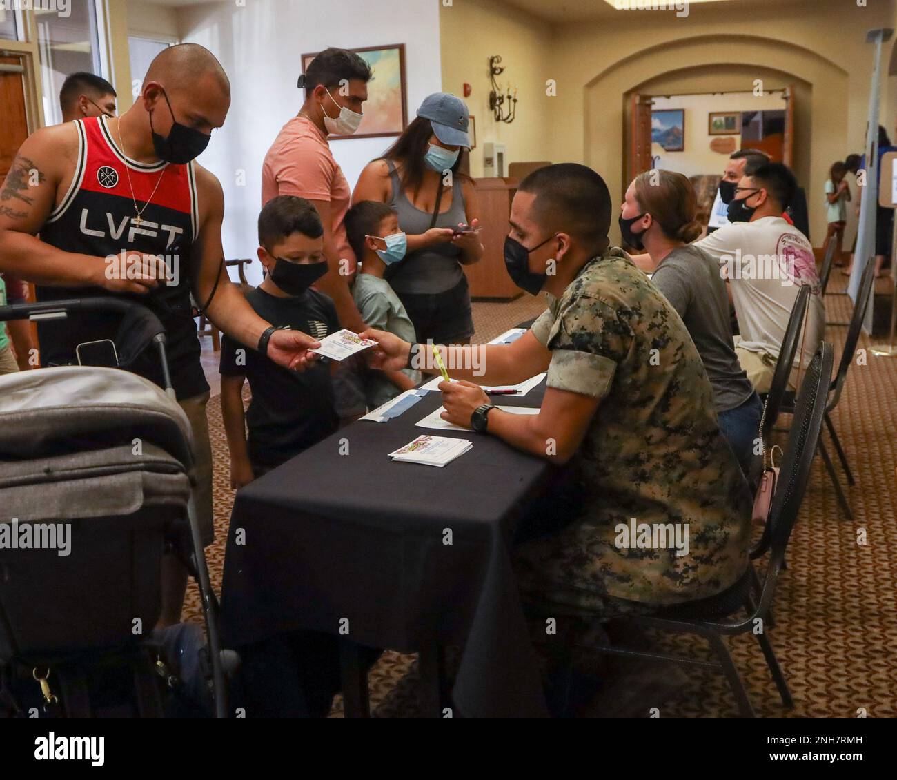 U.S. Marine Corps Sgt. Alexis Fernandez, right, aviation supply