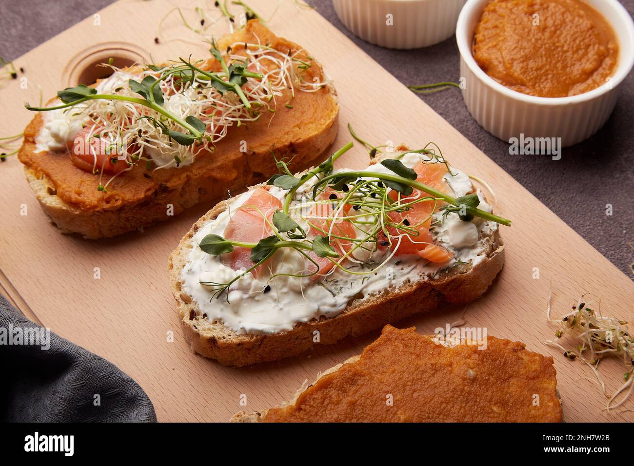 Aesthetic sandwiches with zucchini and cream cheese spread, alfalfa