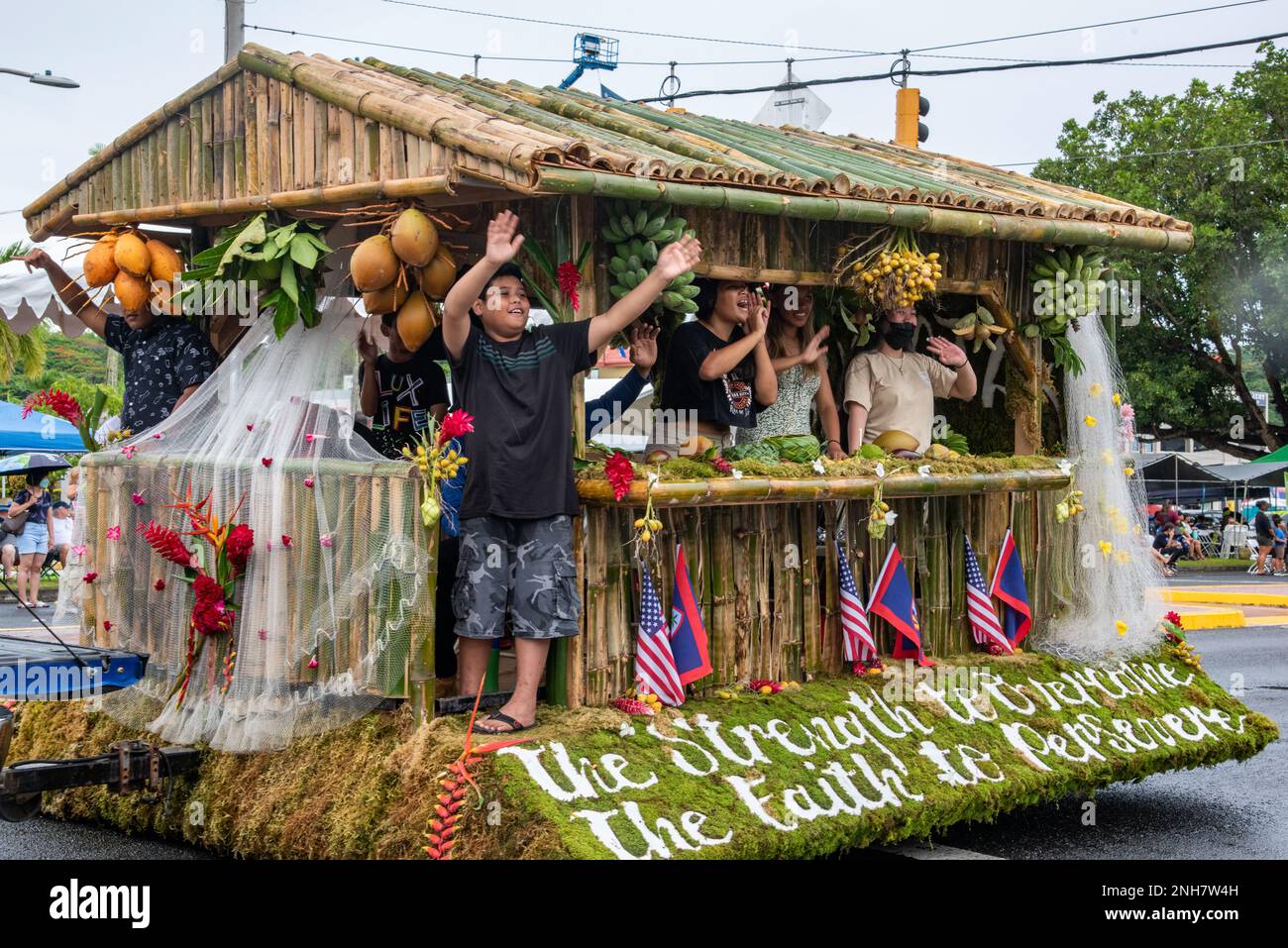 HAGÅTÑA, Guam (July 25, 2022) A village float makes its way down