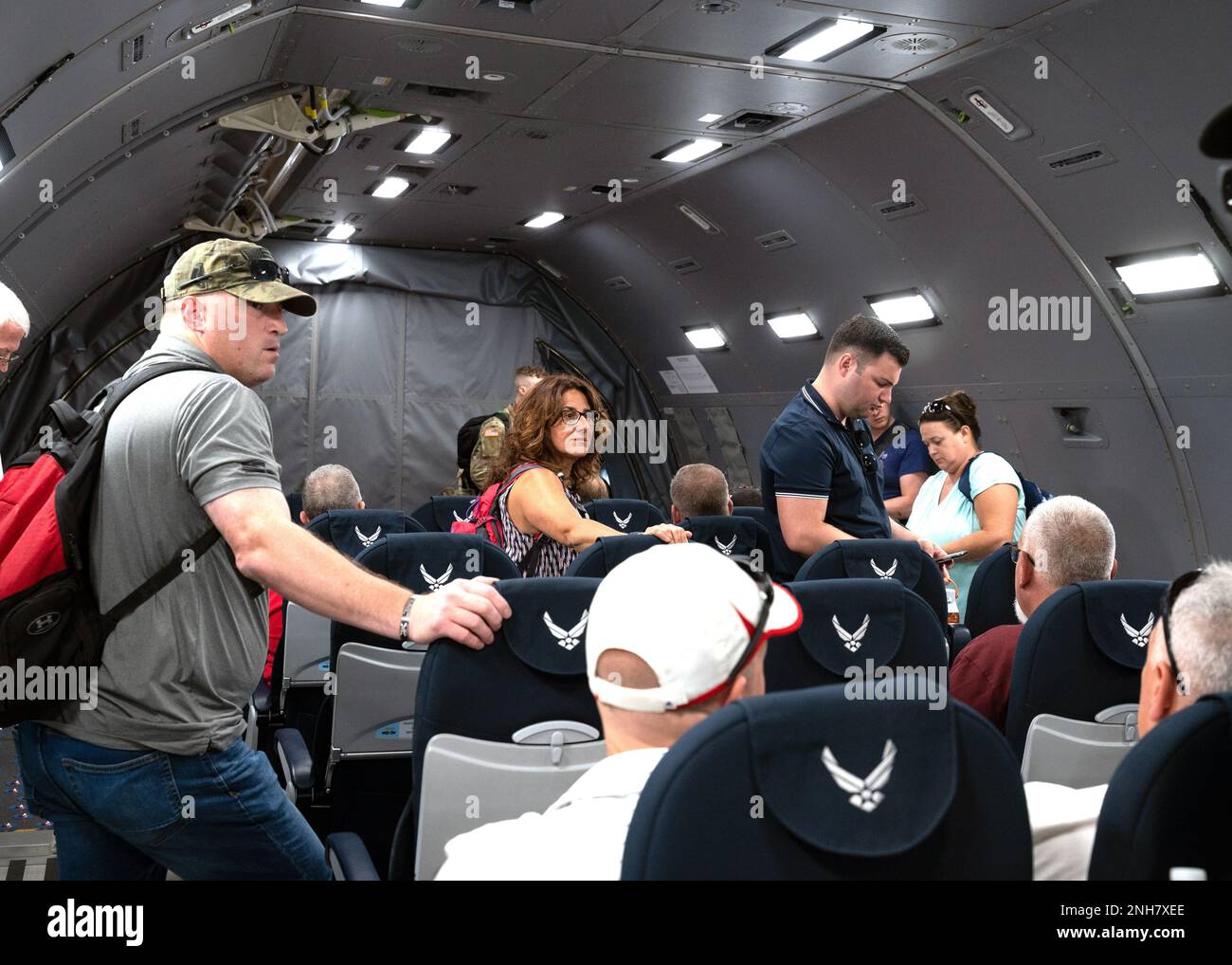Civilian passengers board a “Boss Lift” KC46A Pegasus flight that