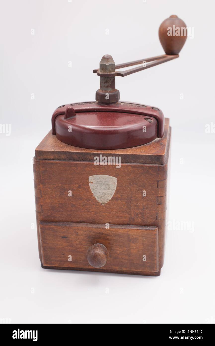 tobacco grinder with handle An antique tobacco grinder with handle Stock Photo