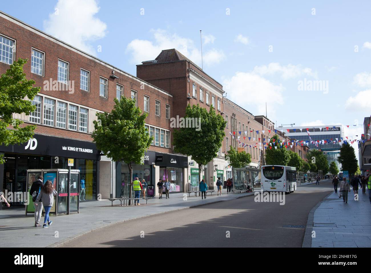 People on the High Street in Exeter, Devon in the UK Stock Photo