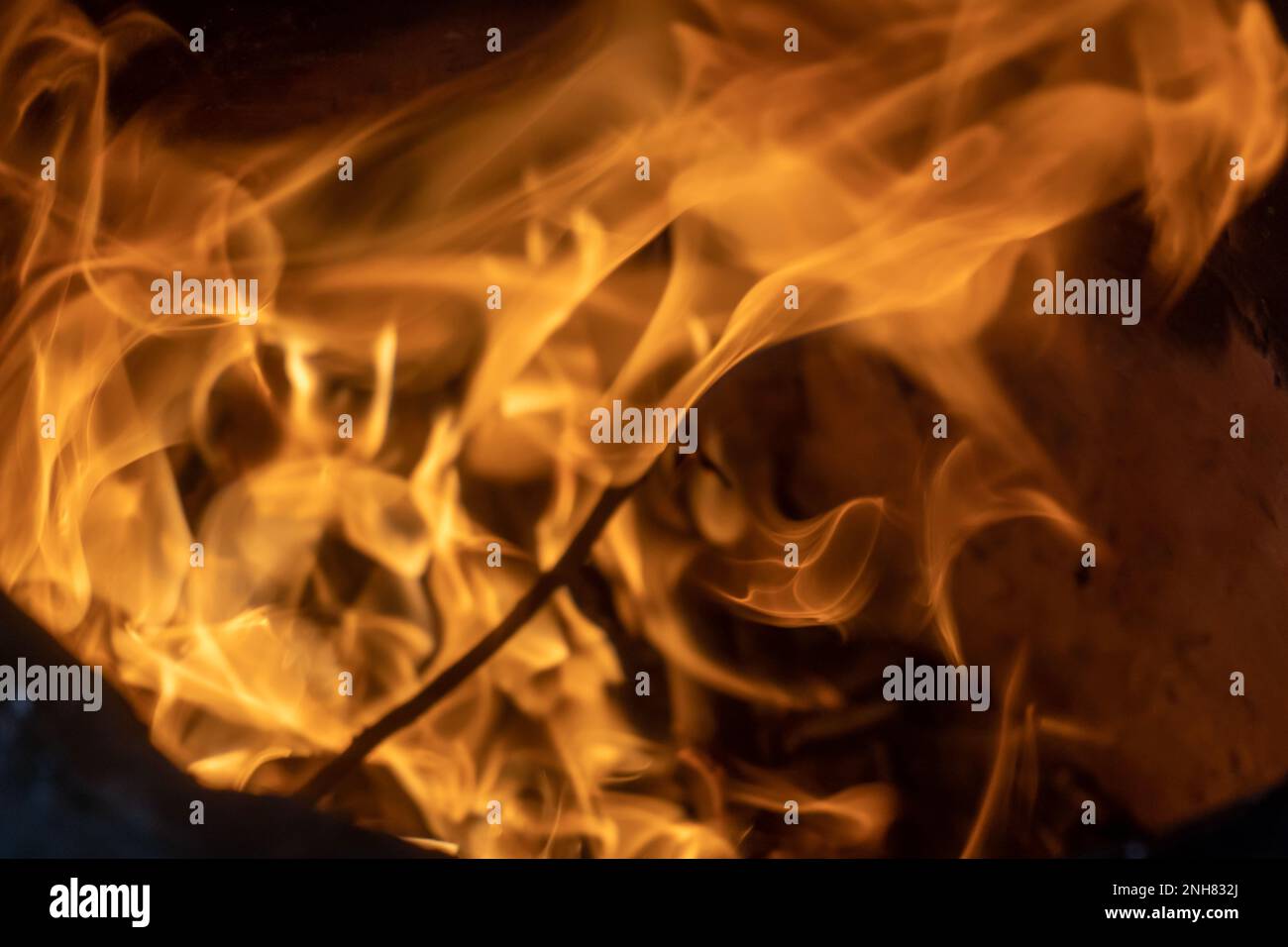 Extremely hot explosion with sparks and hot smoke. Flame and light