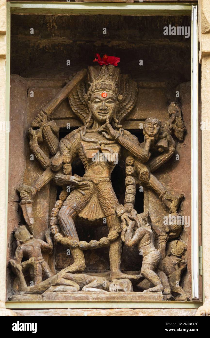 Carving Sculpture of Goddess Chamunda on the Shiv Temple, Baijnath, Himachal Pradesh, India. Stock Photo