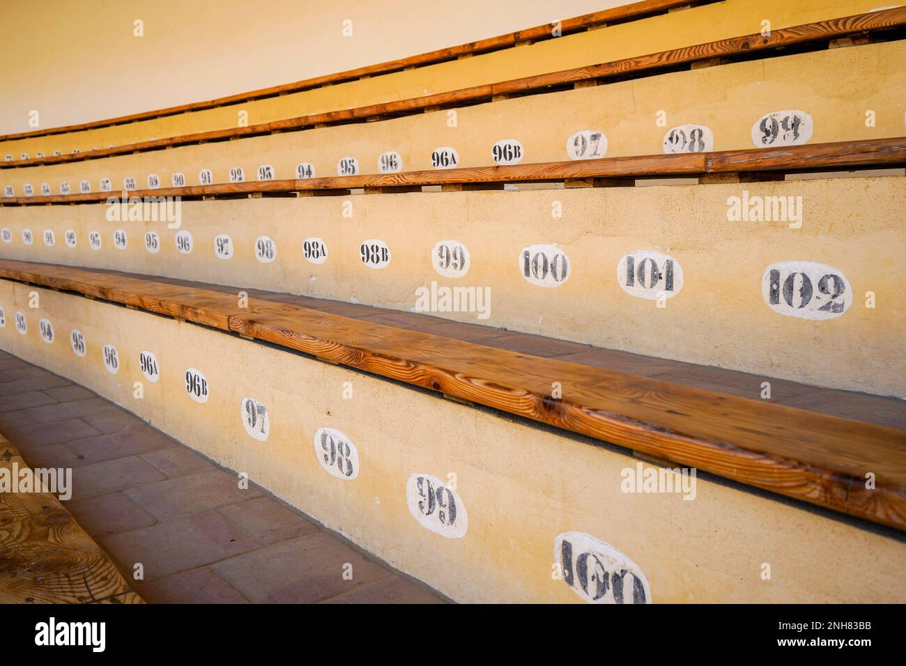 Ronda Bullring, numbered seatings in Bullrings in Spain, Ronda,  Andalucia, Spain. Stock Photo