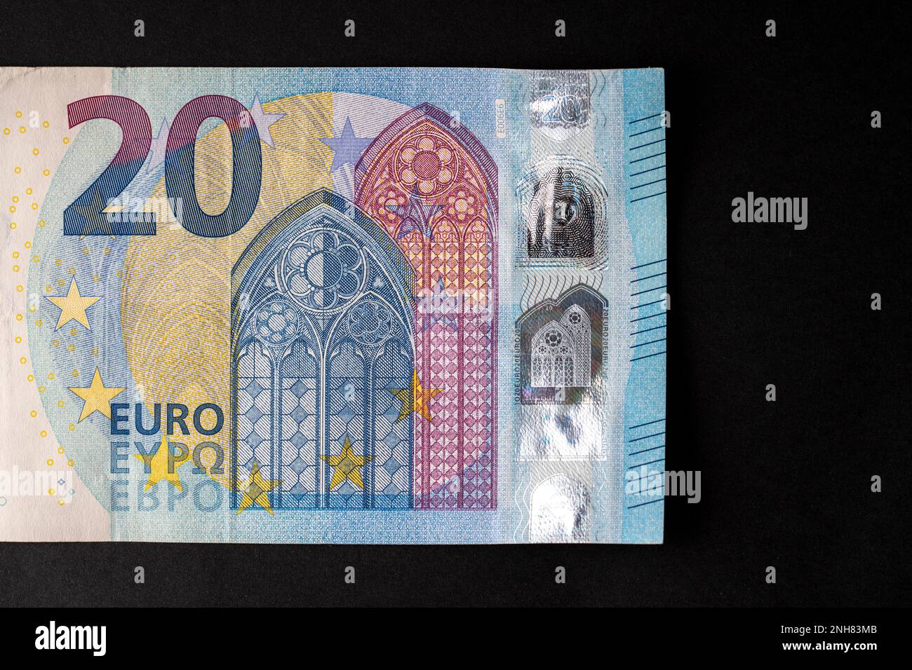 20 euro close up on black background for business finance subjects. World money concept, inflation and economy concept. Currency close up in detail. Stock Photo