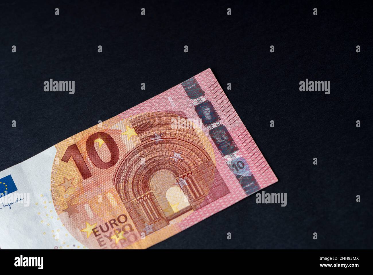 10 euro close up on black background for business finance subjects. World money concept, inflation and economy concept. Currency close up in detail. Stock Photo