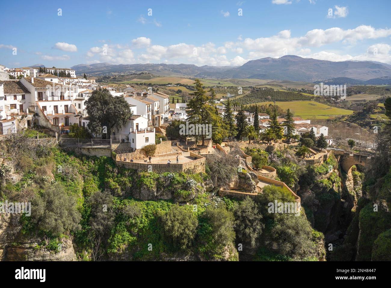 The deep Tajo gorge of Ronda, that splits the spanish village in two from the Puente Nuevo bridge, Ronda, Andalucia, Spain. Stock Photo