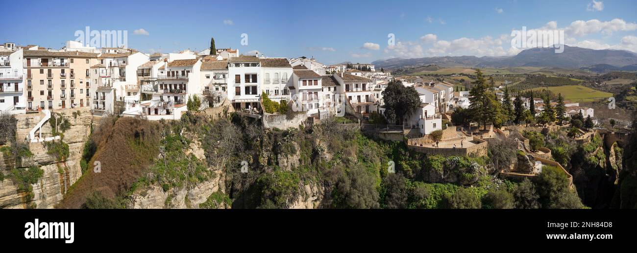 The deep Tajo gorge of Ronda, that splits the spanish village in two from the Puente Nuevo bridge, Ronda, Andalucia, Spain. Stock Photo