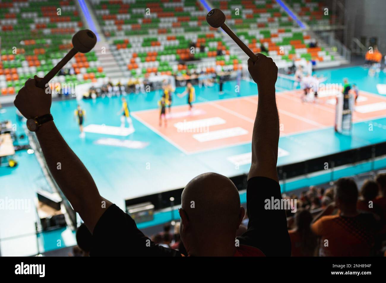 The drummer's cheering during a volleyball match Stock Photo