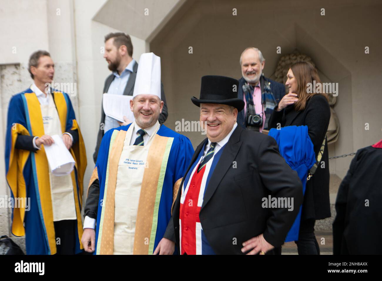 London, UK. 21st Feb, 2023. Shrove Tuesday Livery companies pancake race, Guildhall London UK