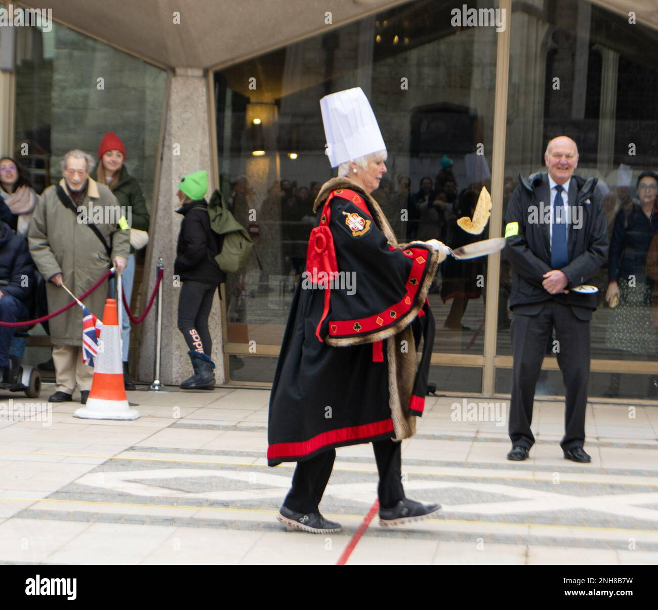London, UK. 21st Feb, 2023. Shrove Tuesday Livery companies pancake race, Guildhall London UK