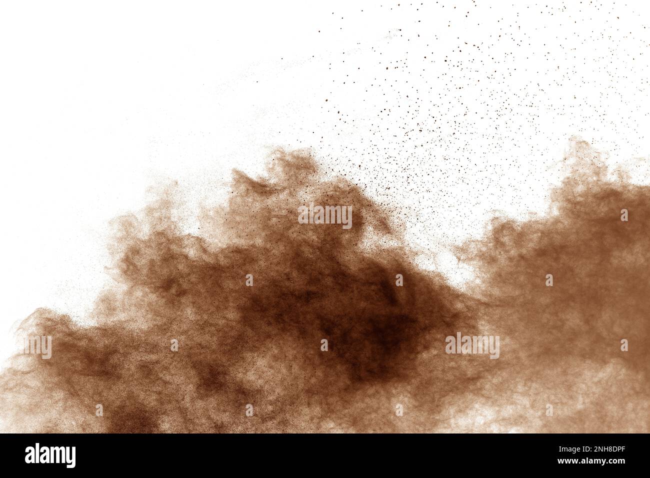 Freeze motion of brown dust explosion.Stopping the movement of brown powder. Stock Photo