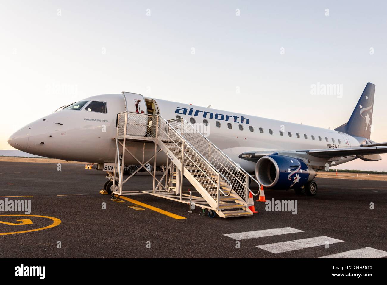 An Embraer 170 Airnorth aircraft on the apron at Kununurra airport - East Kimberley Regional Airport in the Kimberley region of Western Australia.  Ai Stock Photo