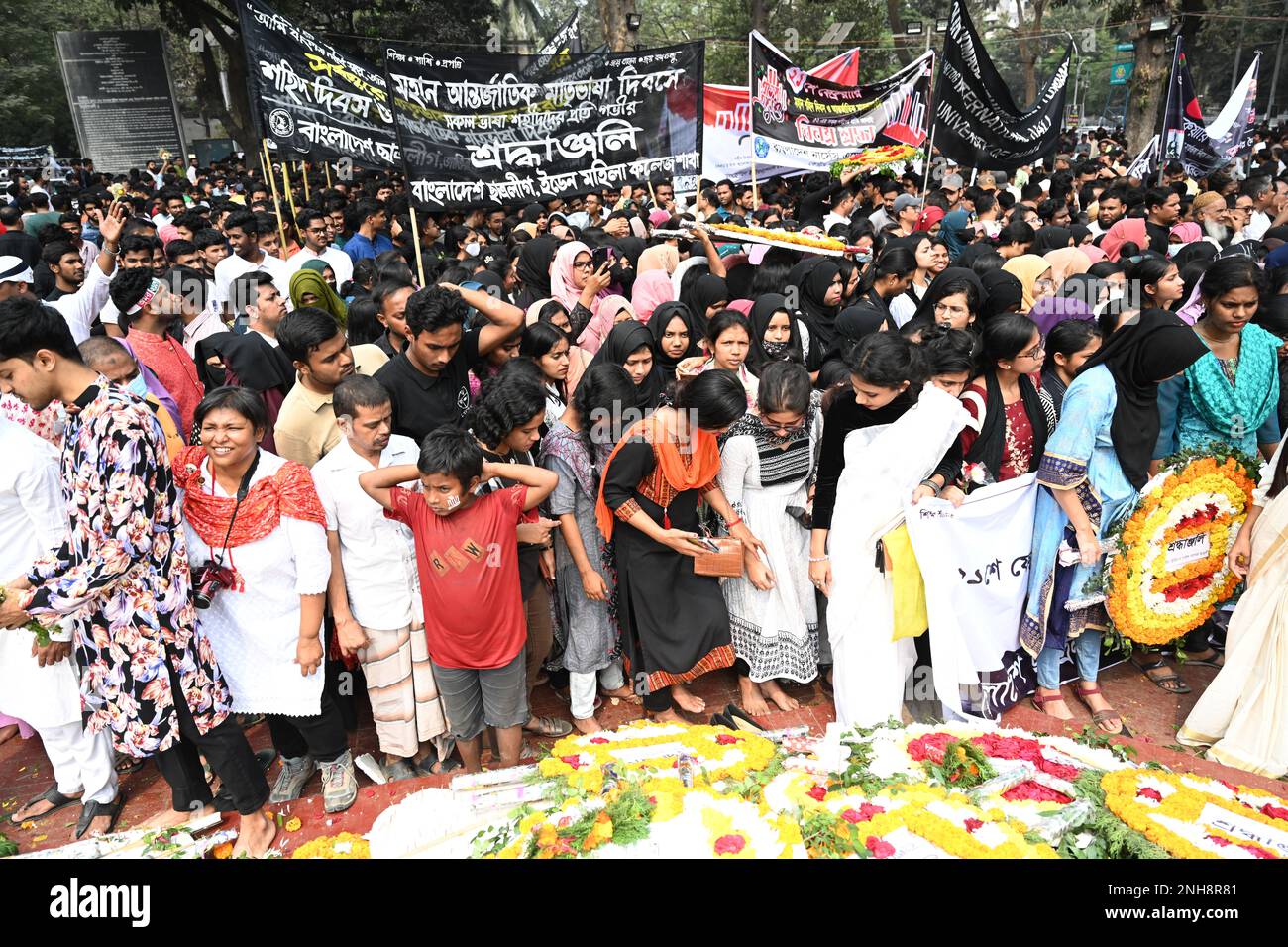 Dhaka, Bangladesh. 21st Feb, 2023. People lay flower wreaths at the