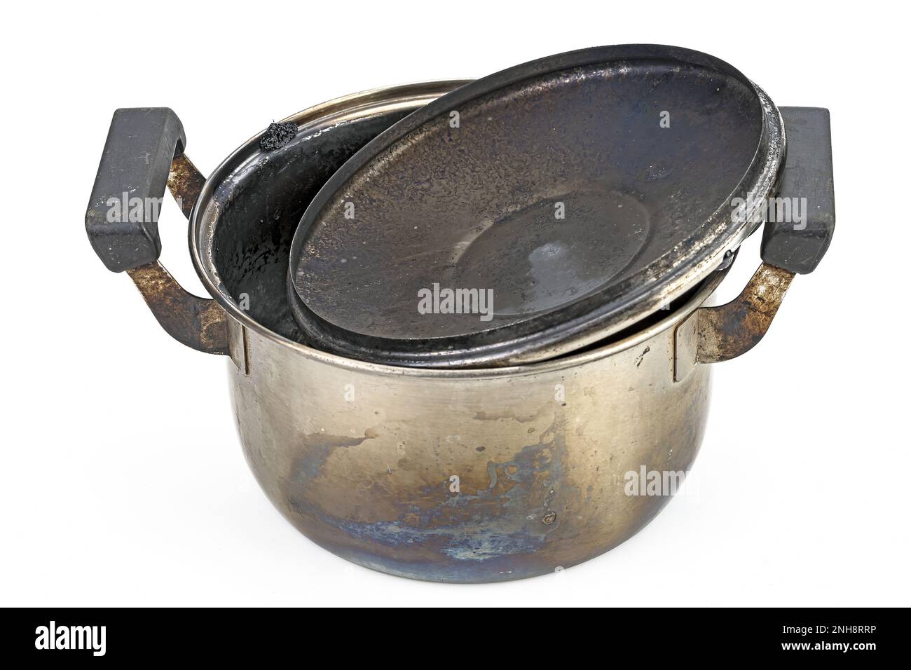 A stainless steel pot with burnt marks lid from being left on the stove