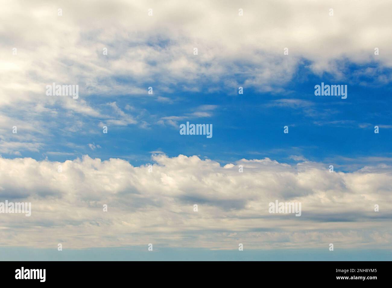 Blue sky with clouds pattern nature background Stock Photo - Alamy
