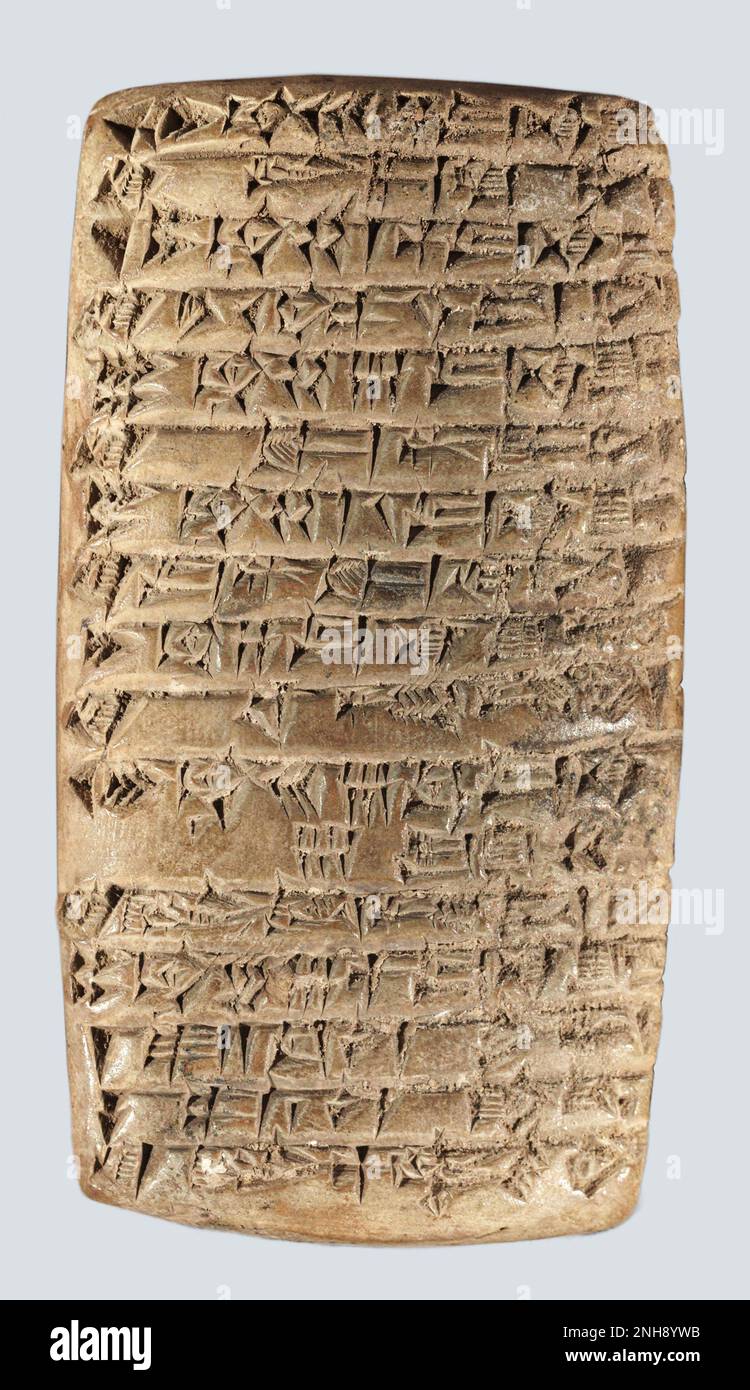 Sumerian accounting tablet written in cuneiform script, dating from between 2200 BC and 1900 BC. Some of it concerns the receipt of she-goats and lambs. Stock Photo