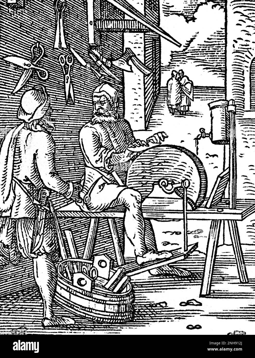 A knife-grinder sharpening a blade on a grinding wheel as a customer arrives with a plane to be sharpened. Illustration from Jost Amman's Book of Trades, 1568. Stock Photo