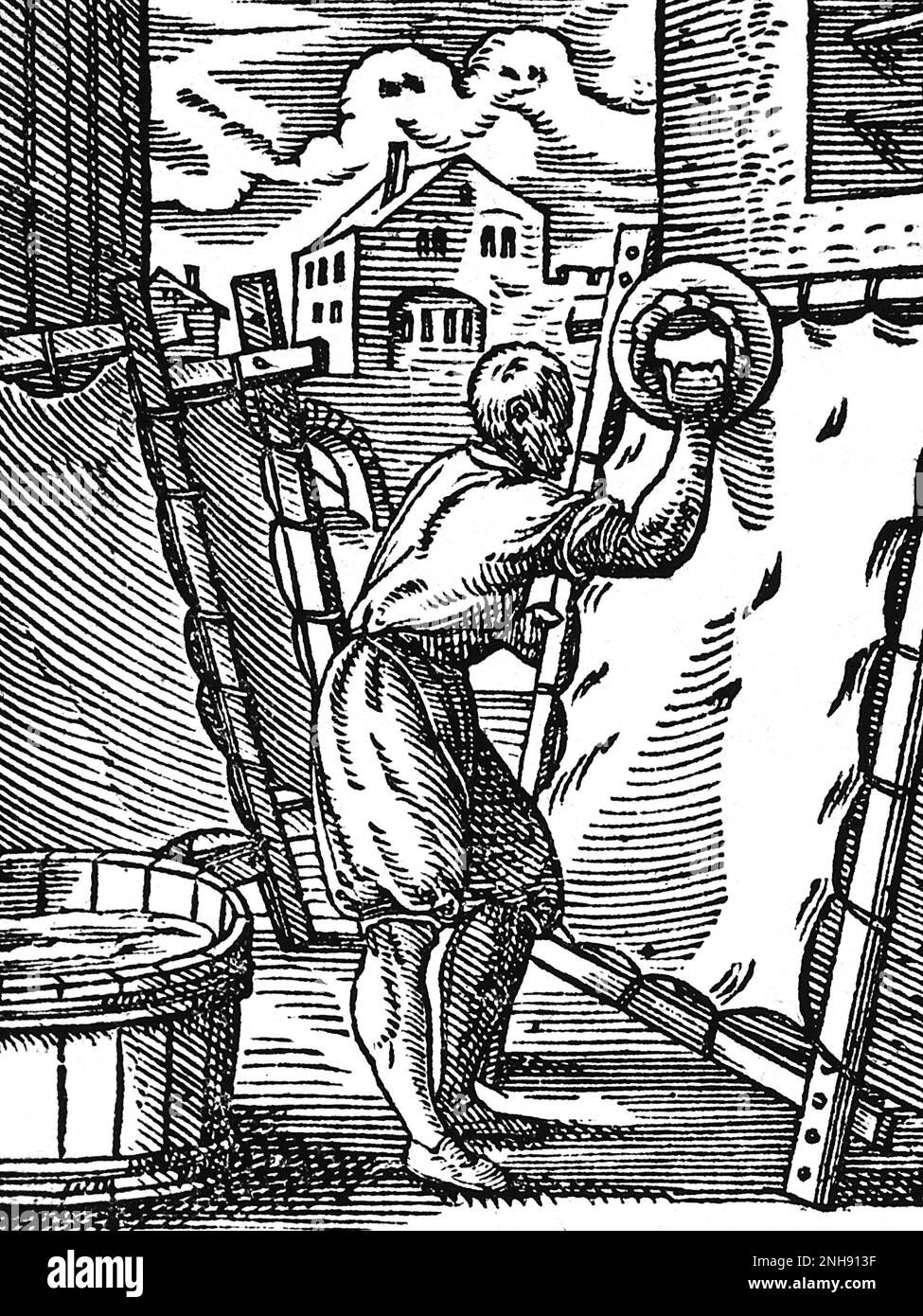 A 16th-century parchment-maker smoothing an animal hide on a stretcher. Illustration from Jost Amman's Book of Trades, 1568. Stock Photo