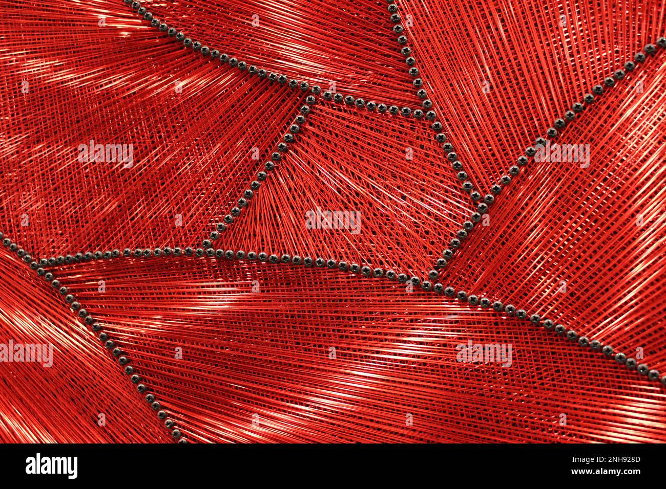 Turkish art made of threads fastened by screws Stock Photo