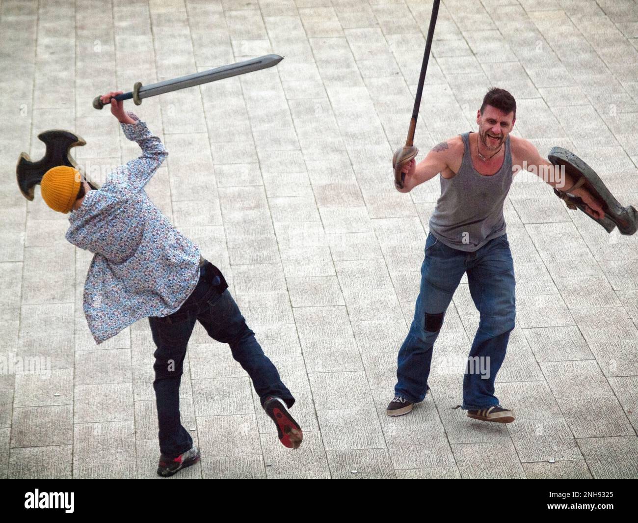Sword fighting on the seafront at Brighton Stock Photo