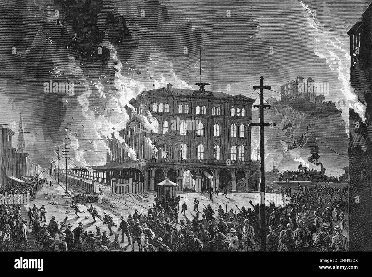 The Great Railroad Strike of 1877 began on July 14 in Martinsburg, West Virginia, after the B&O Railroad cut wages for the third time in a year. It spread to other cities and was ended by federal troops and militia after 52 days. This engraving shows the destruction of the Union Depot, Pittsburgh, PA, 11 August 1877. Illustration from Harper's Weekly. Stock Photo