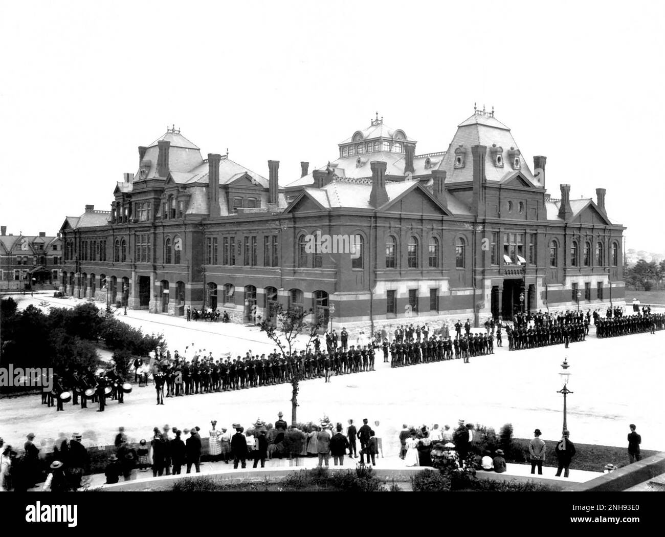 Striking railroad workers confronting Illinois National Guard troops in Chicago during the Pullman Strike, 1894. The Pullman Strike comprised two interrelated strikes in 1894, first by the American Railway Union (ARU) against the Pullman factory in Chicago, and then, when that failed, a national boycott against all trains that carried Pullman passenger cars, which lasted from May 11 to July 20 and was a turning point for US labor law./n/n Stock Photo