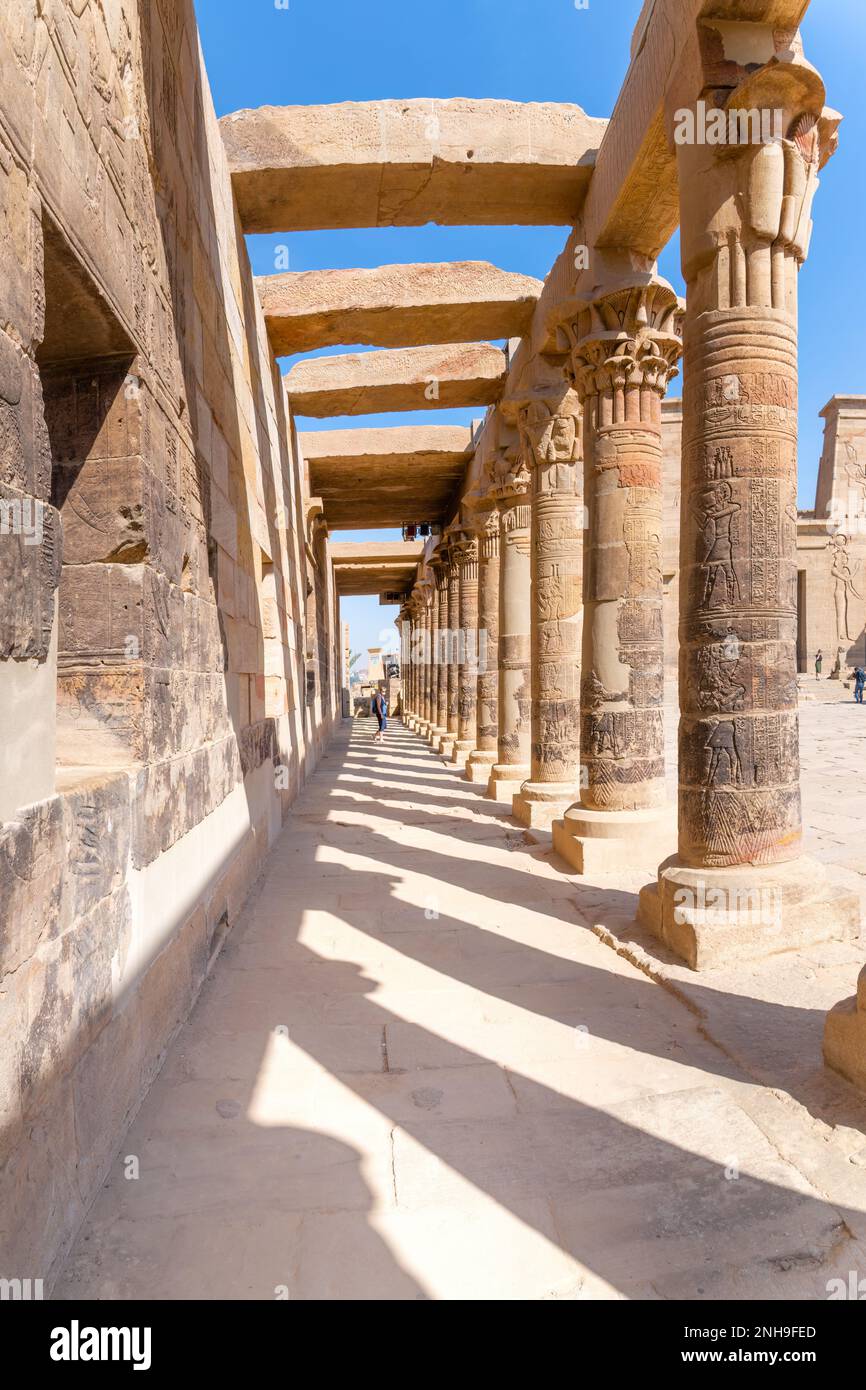 Aswan, Egypt; February 14, 2023 - A row of columns at the Temple of Philae, Aswan, Egypt. Stock Photo