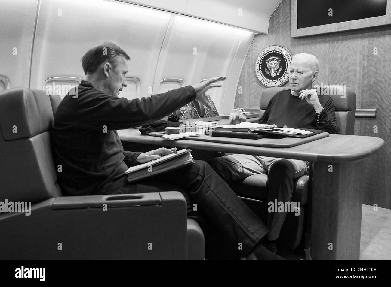 Air Force One, International Airspace. 19th Feb, 2023. Air Force One, International Airspace. 19 February, 2023. U.S. President Joe Biden, right, listens to National Security Advisor Jake Sullivan during a briefing aboard Air Force One on route to Germany, February 19, 2023 in Kyiv, Ukraine. Biden departed Washington at 4:15am to Germany and then on to Poland before board a train to Kiev on an unannounced visit to renew American support for Ukraine. Credit: Adam Schultz/White House Photo/Alamy Live News Stock Photo