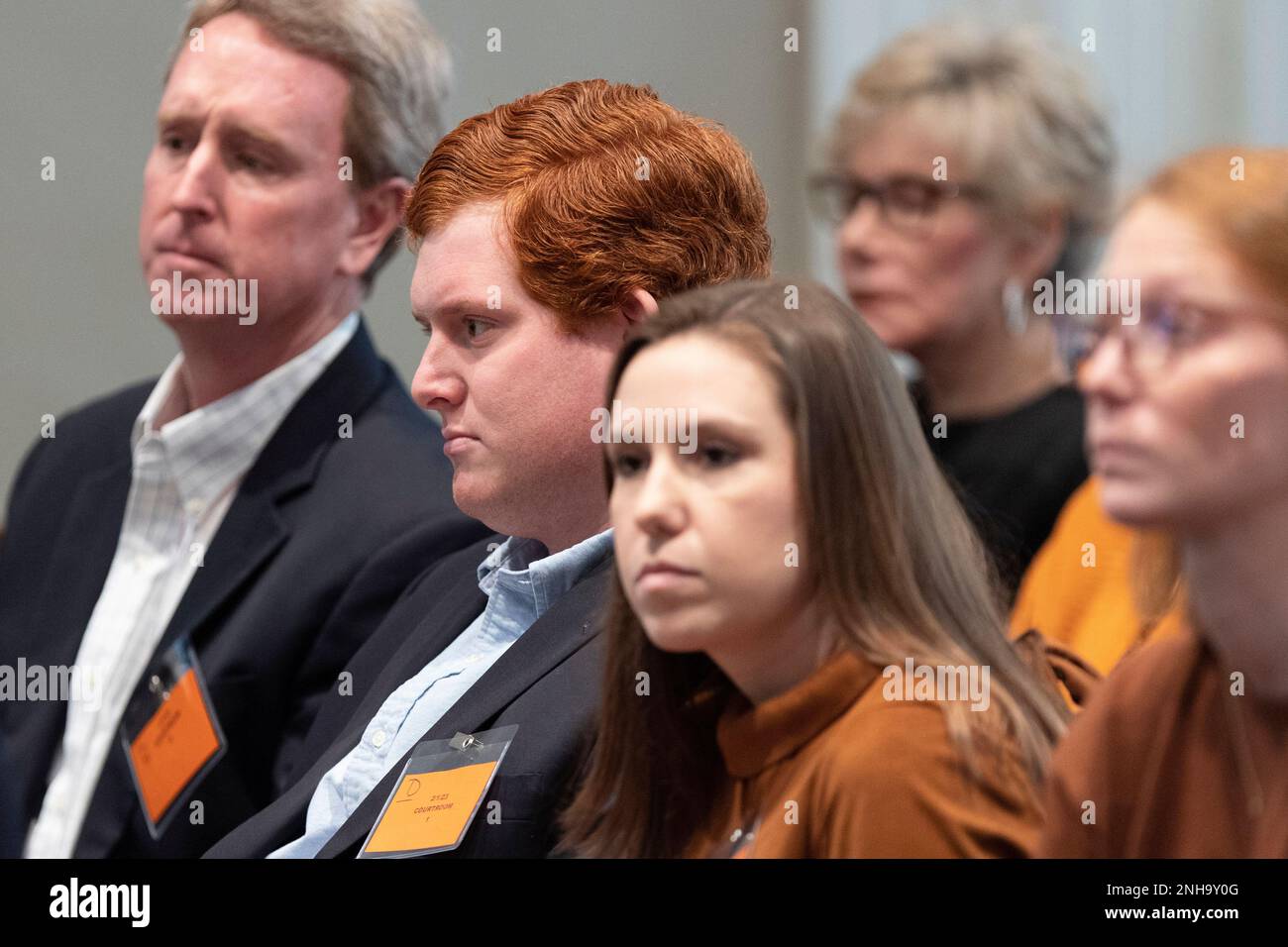Buster Murdaugh, son of Alex Murdaugh, sits with family and friends