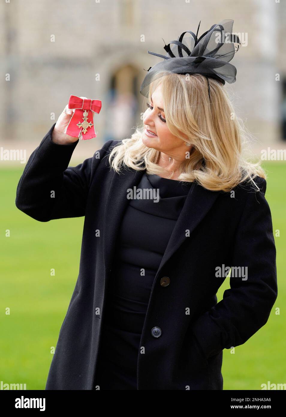 Welsh singer Bonnie Tyler, born Gaynor Sullivan, poses with her MBE ...