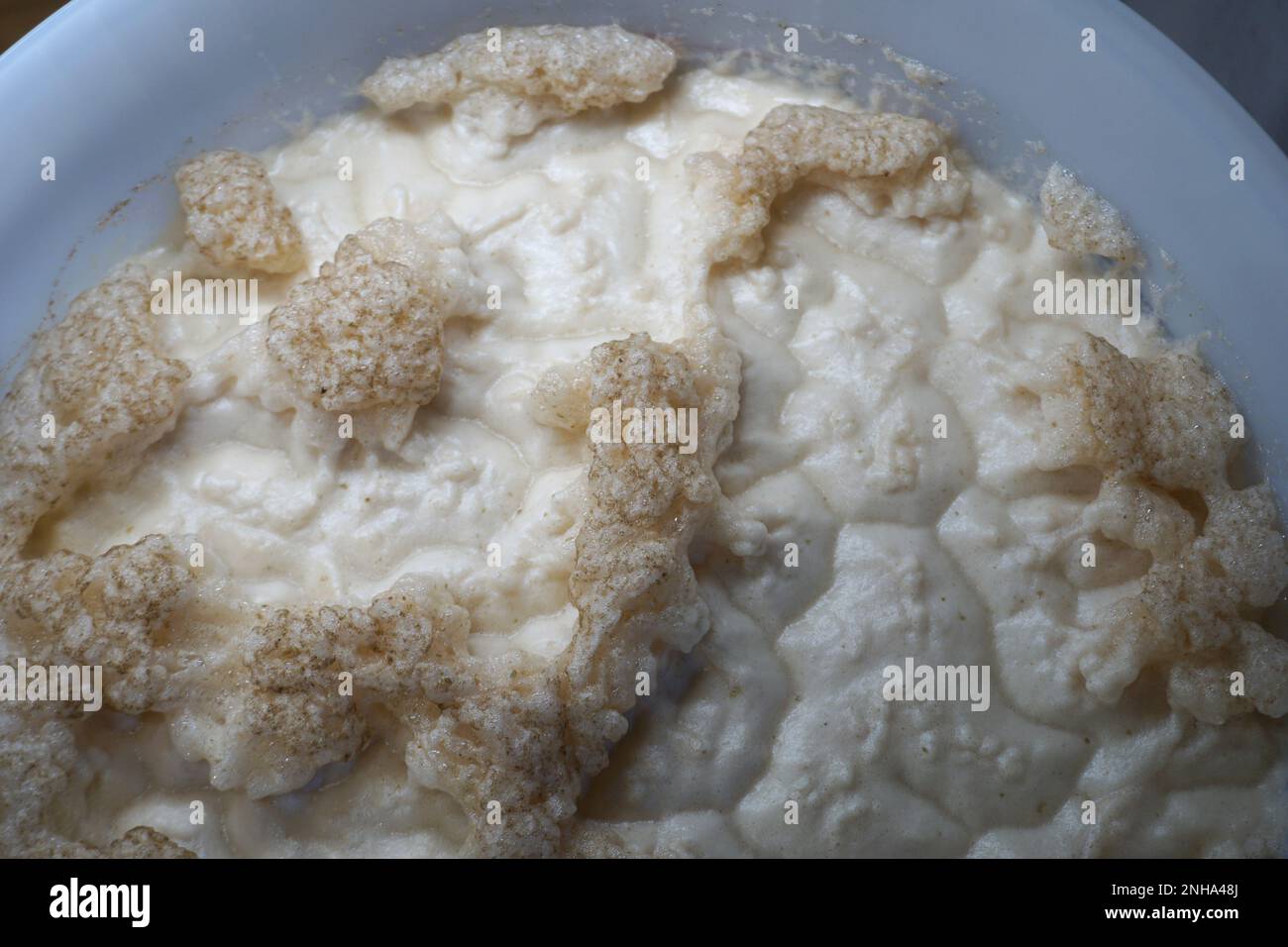 Beer yeast foam in fermenter alcohol fermentation process Stock Photo