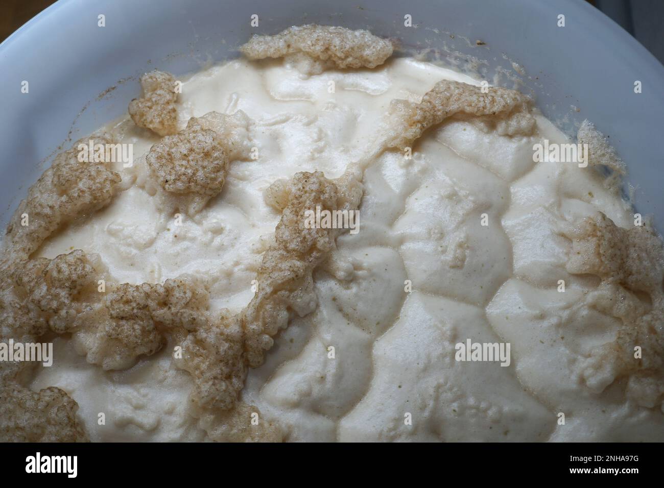 Beer yeast foam in fermenter alcohol fermentation process Stock Photo