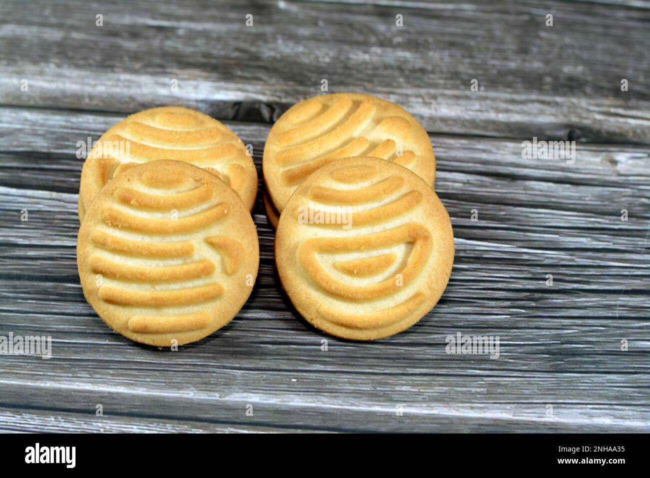 Butter cookies biscuits isolated, selective focus of a pile and a stack ...