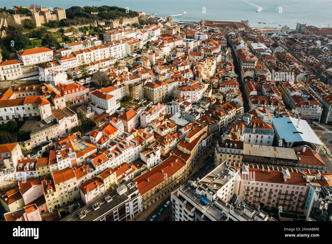 Aerial drone view of St. George Castle in Lisbon, Portugal with surrounding cityscape Stock Photo