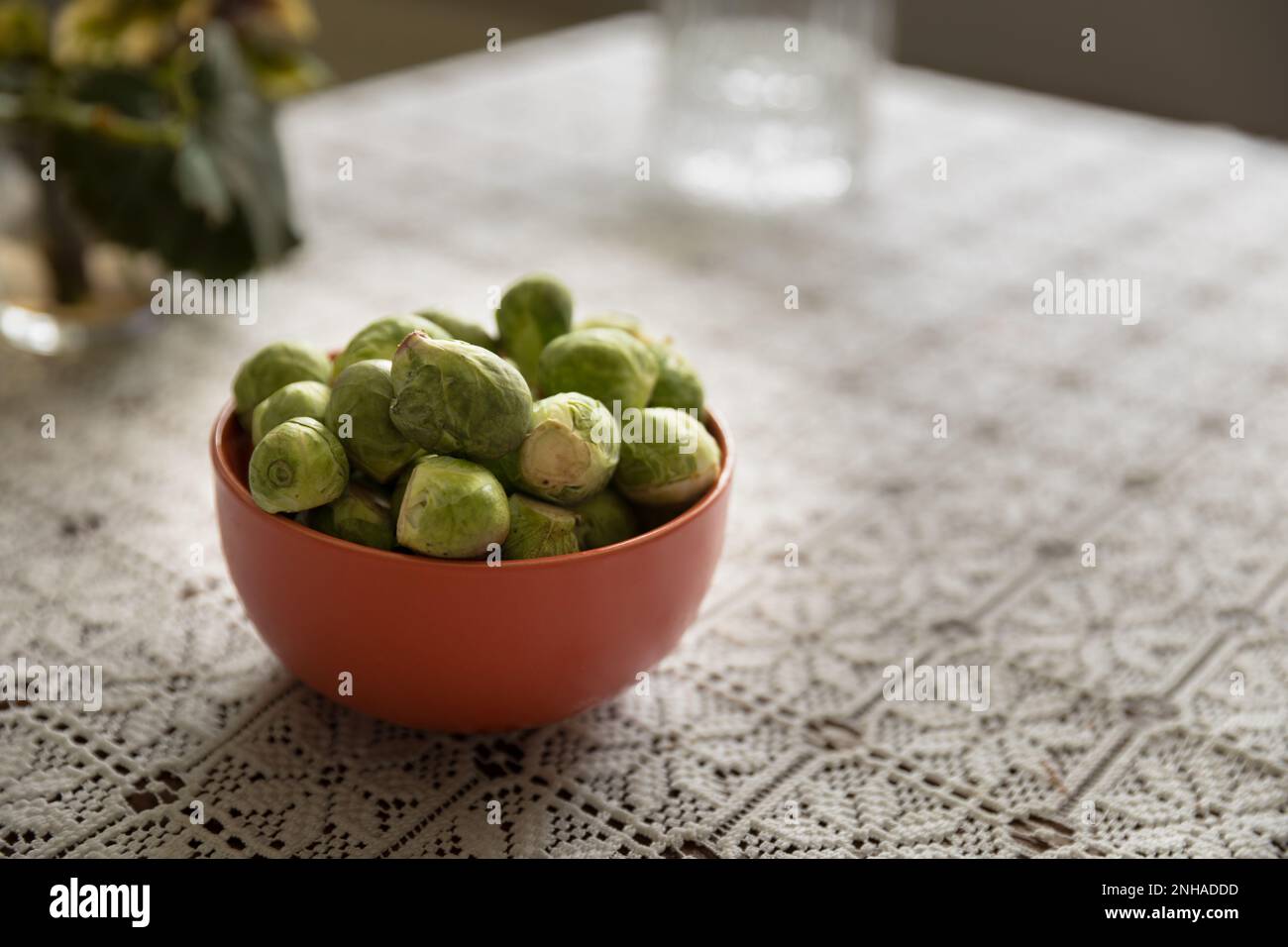 Brussels sprouts in a clay pot, healthy vegetables Stock Photo Alamy