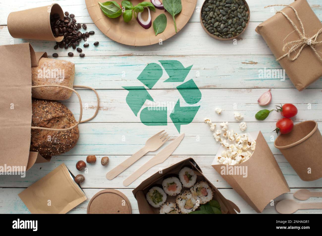 Collection of eco sustainable food packaging with recycling symbol, low carbon green revolution concept Stock Photo