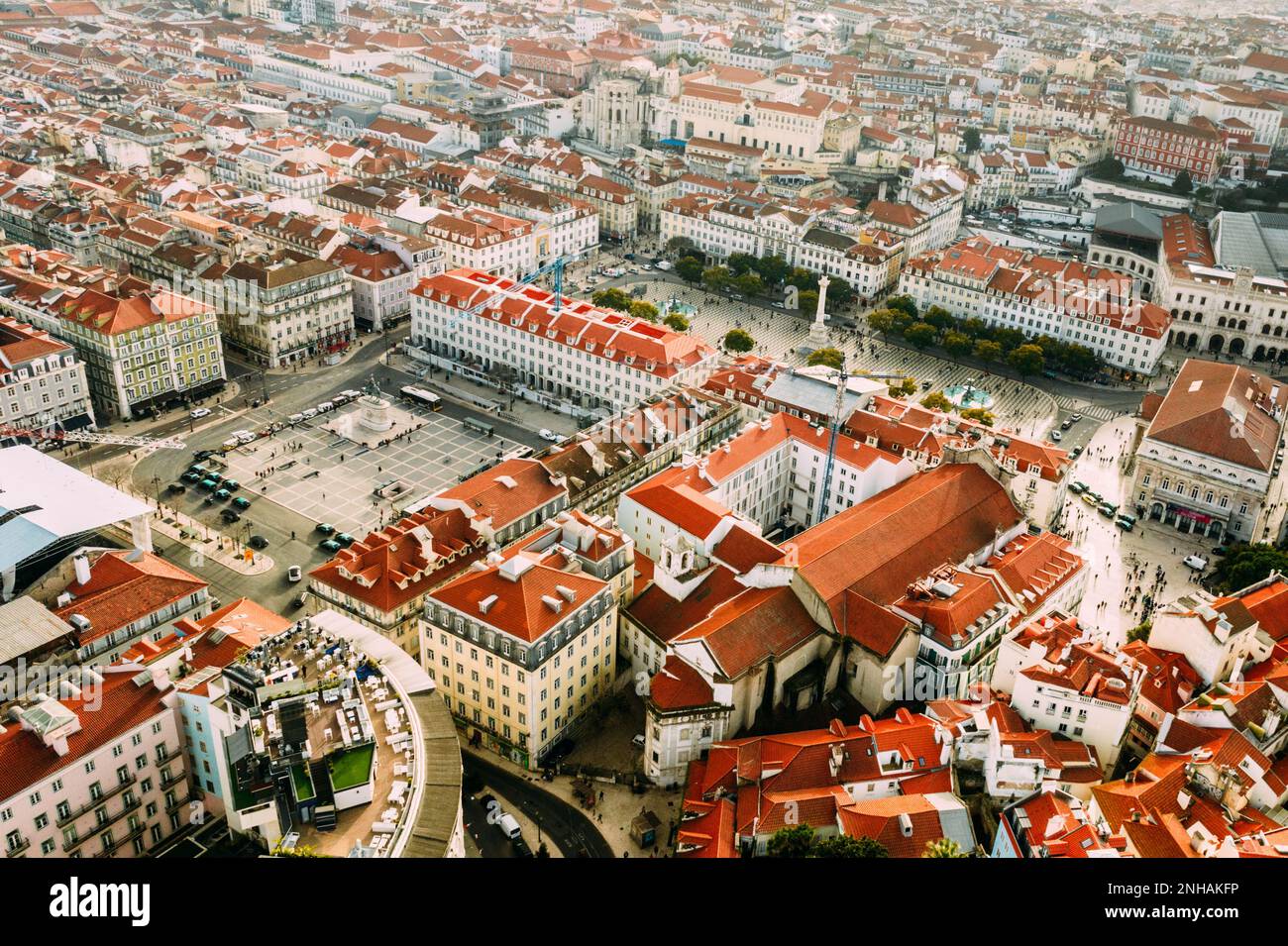 Aerial drone view of major squares and landmarks in Lisbon's Baixa District, including Figueira and Rossio Squares Stock Photo