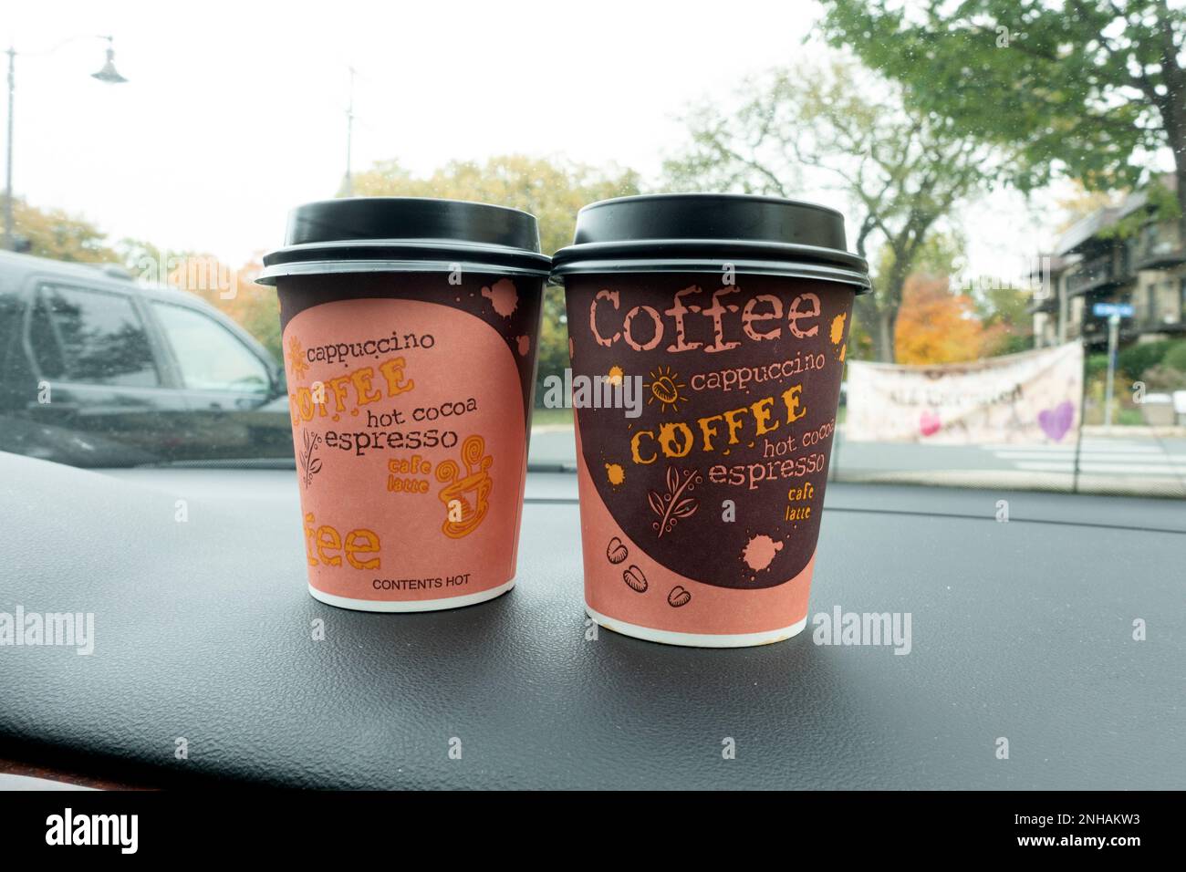 Two espresso coffees on the dashboard from the MelOGlaze Bakery