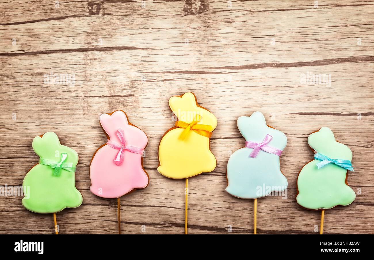 Easter composition with  easter cookies on wooden background. Easter concept with copy space. Flat lay, top view. Stock Photo