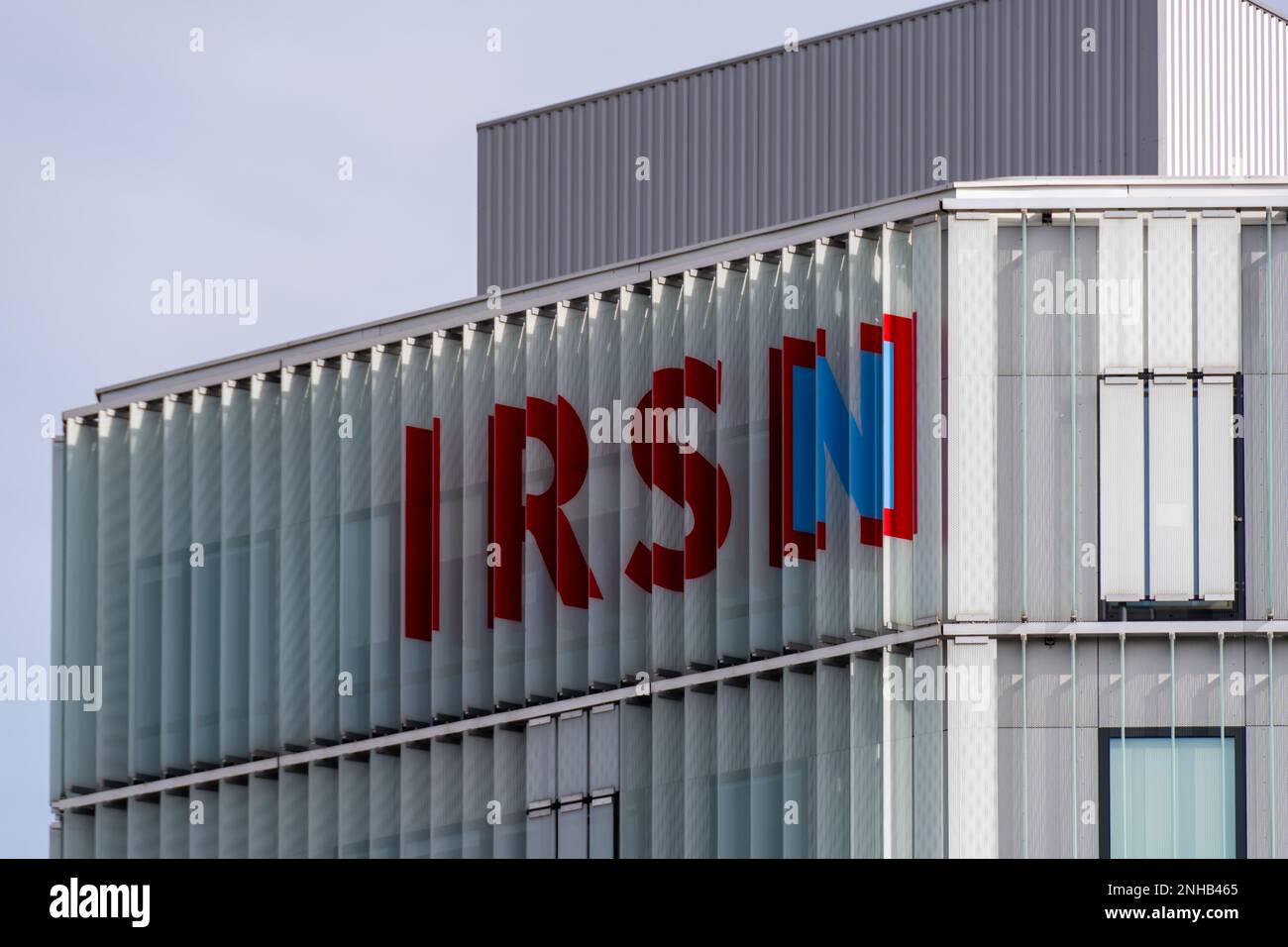 Sign on top of the Institute for Radiation Protection and Nuclear Safety (IRSN), a French public institute studying nuclear and radiological risks Stock Photo