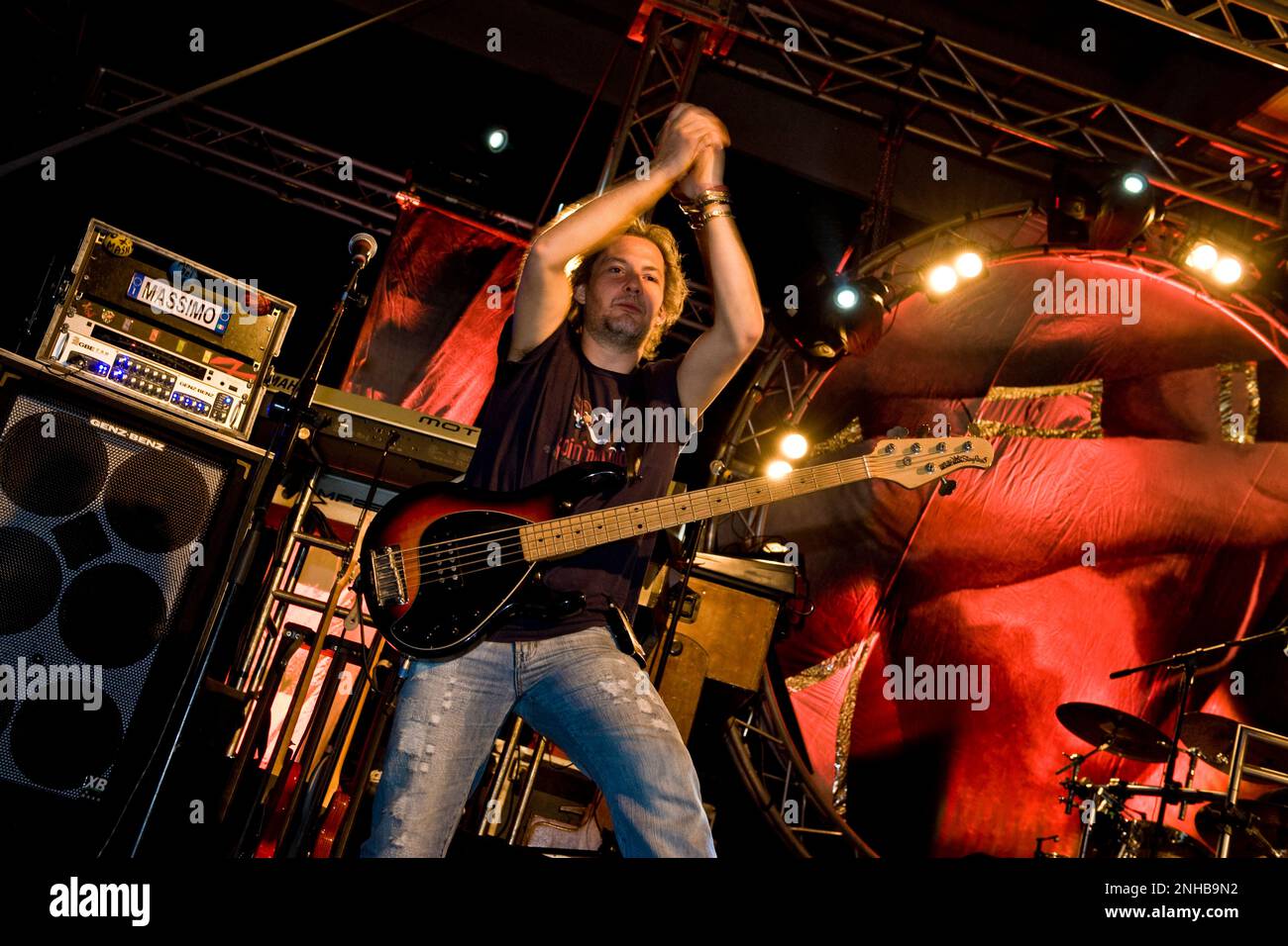 Massimo Vecchi, voice and bass guitar, Nomadi in concert, Crescentino, Vercelli province, Italy, 28.05.2010 Stock Photo