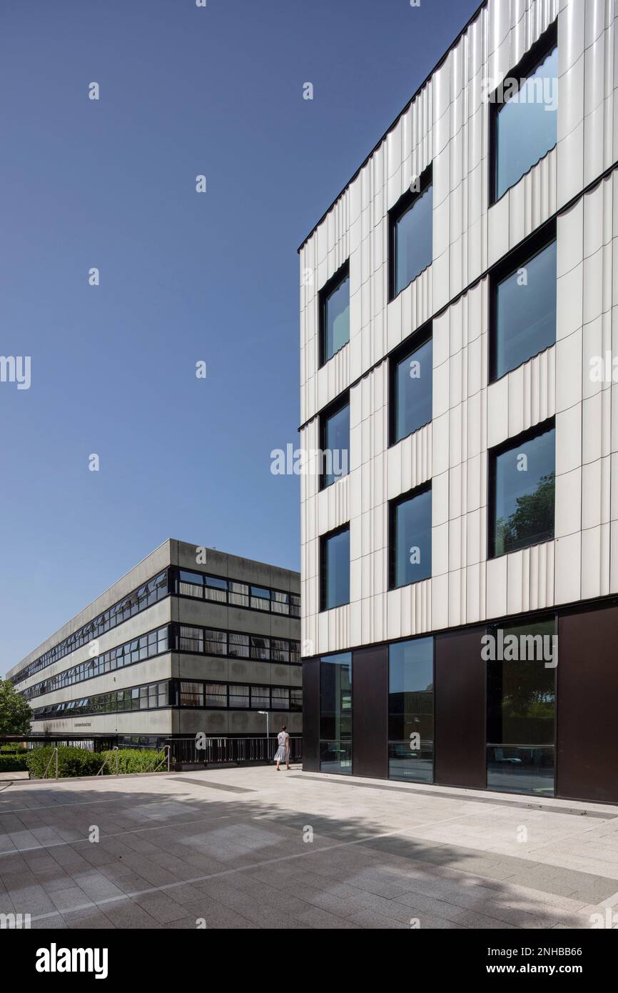 Wide angle shot showing the old building in the background, with a ...